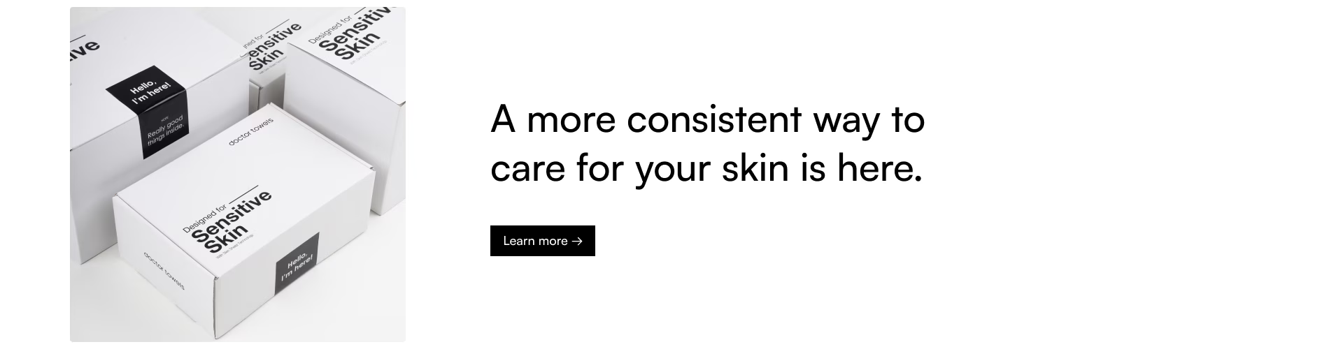 White skincare product packaging with text on a white background
